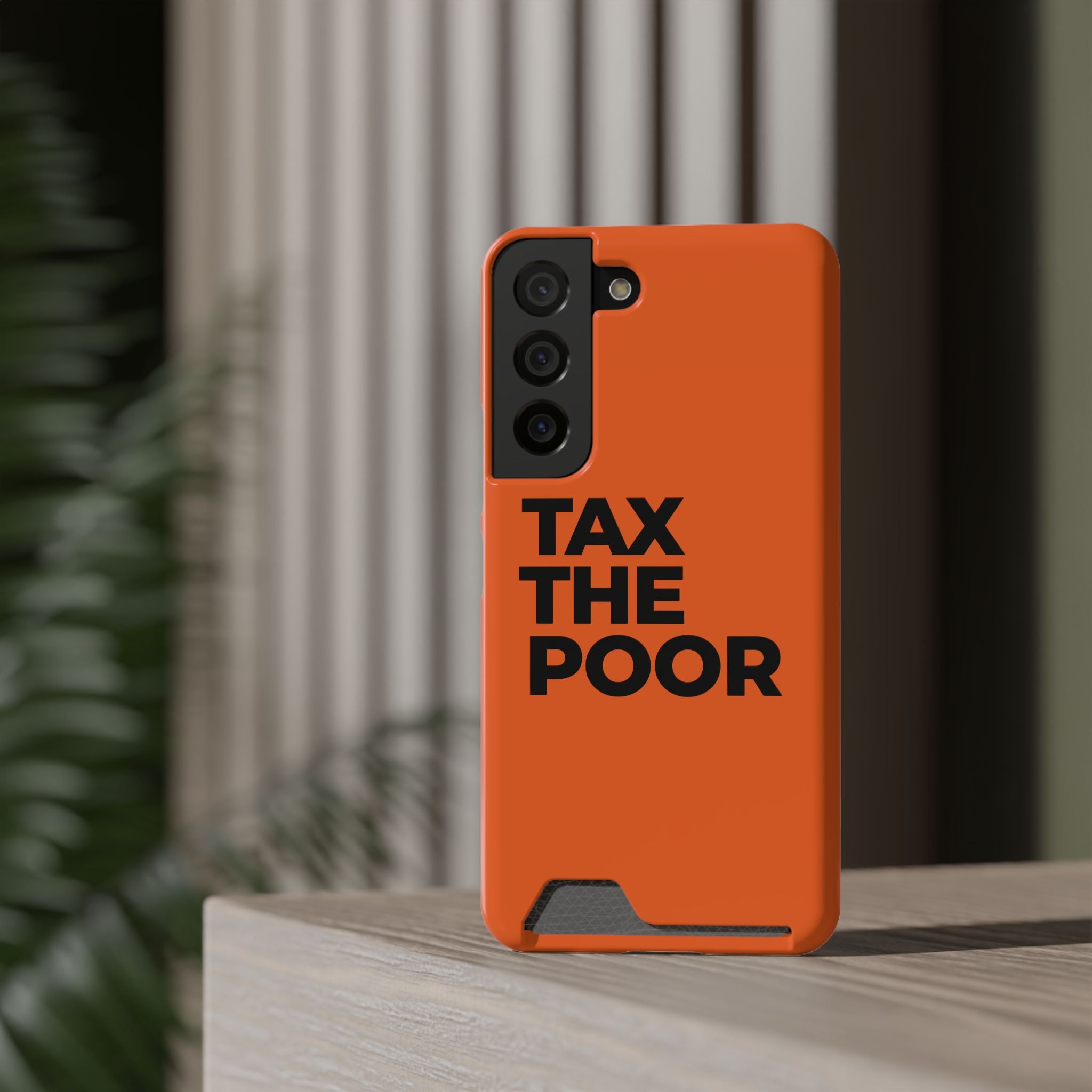 TAX THE POOR on a phone case with card holder
